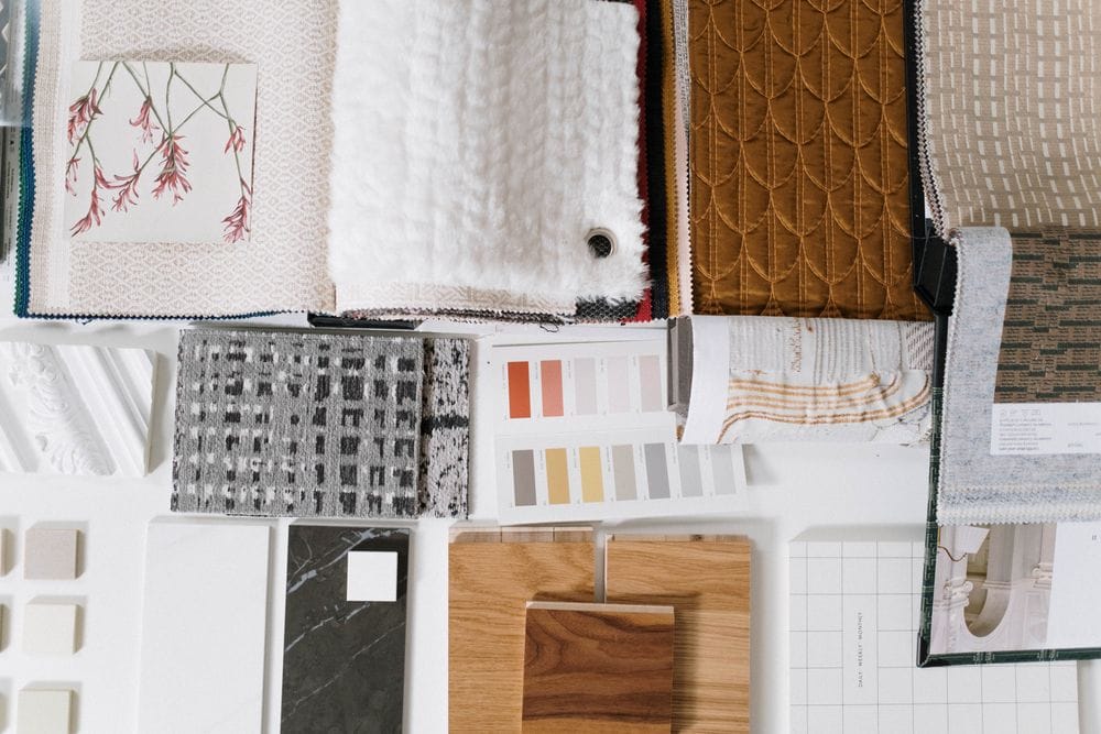 Flat lay of fabric, tile and wood material samples